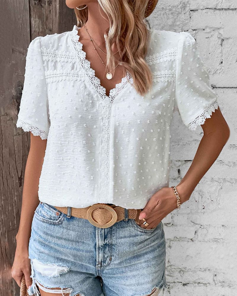Elegante kanten blouse met V-hals en korte mouwen