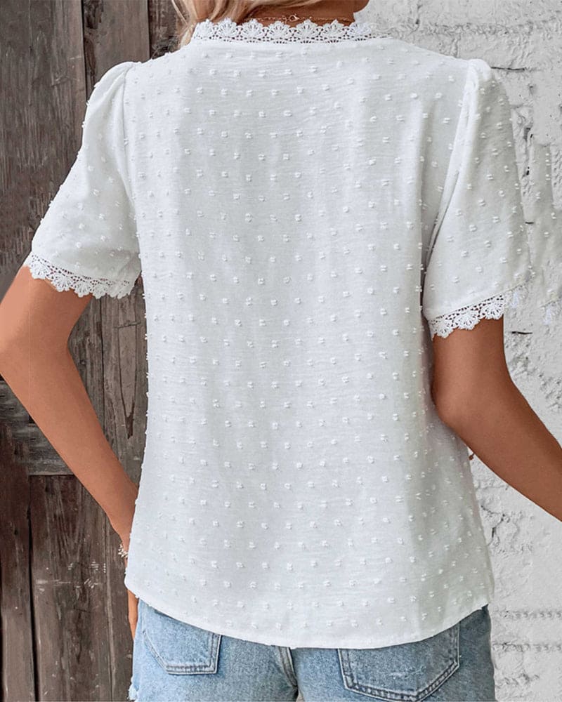 Elegante kanten blouse met V-hals en korte mouwen
