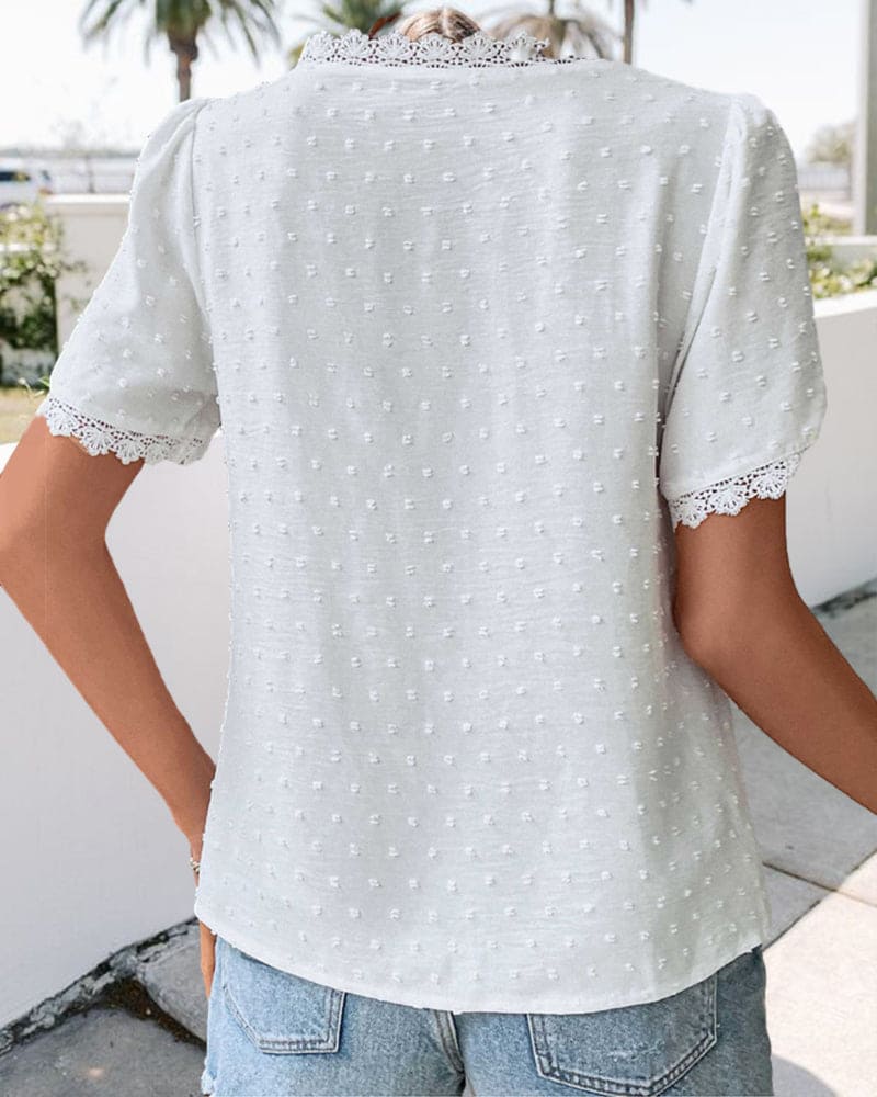 Elegante kanten blouse met V-hals en korte mouwen