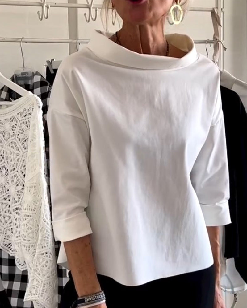 Haut en maille blanche avec revers - élégance intemporelle redéfinie
