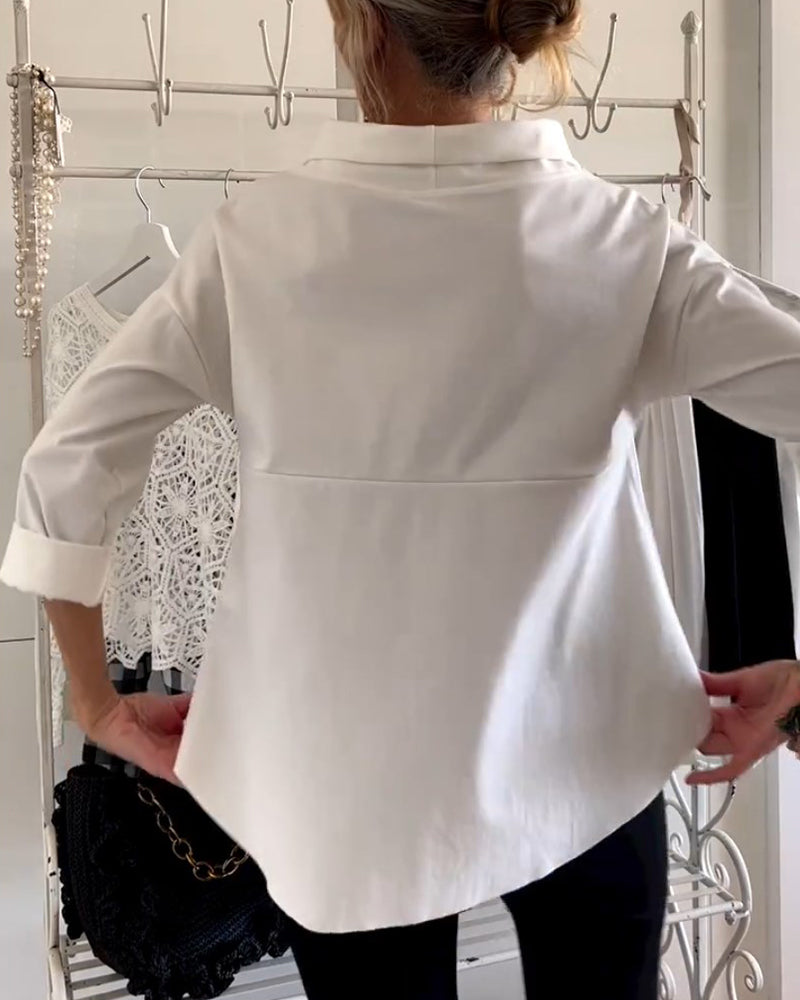 Haut en maille blanche avec revers - élégance intemporelle redéfinie