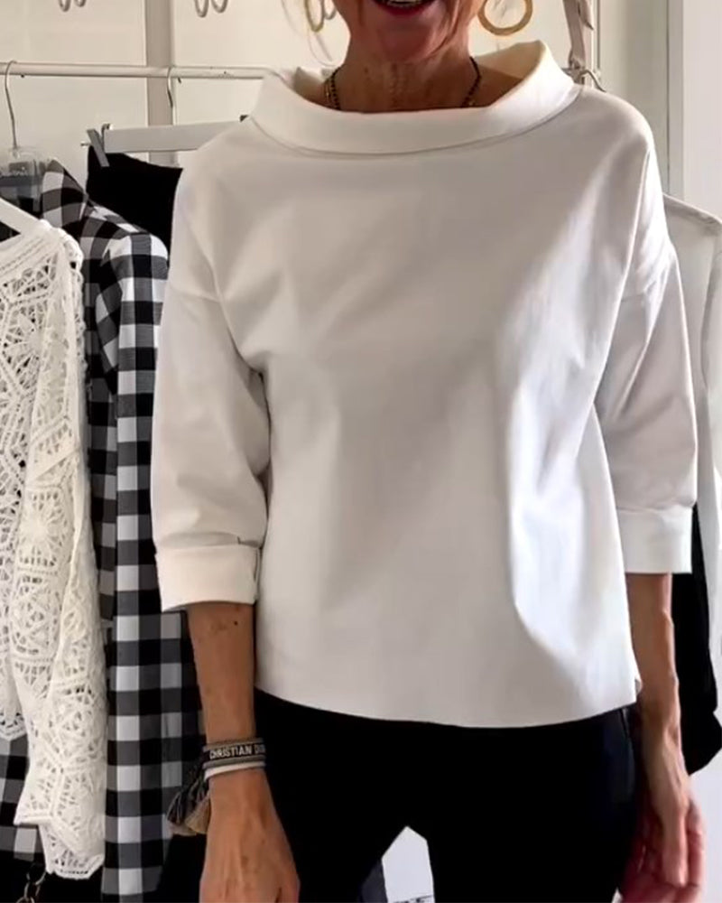 Haut en maille blanche avec revers - élégance intemporelle redéfinie