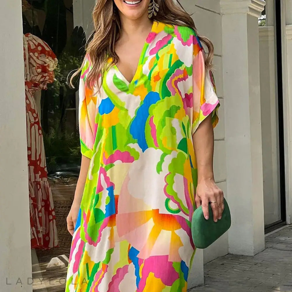 Lola – Stijlvolle Kleurrijke Midi-Jurk voor Zomerse Dagen en Elegantie
