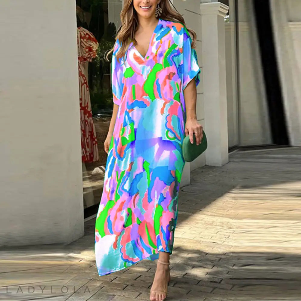 Lola – Stijlvolle Kleurrijke Midi-Jurk voor Zomerse Dagen en Elegantie